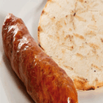 CHORIZO ASADO CON AREPA